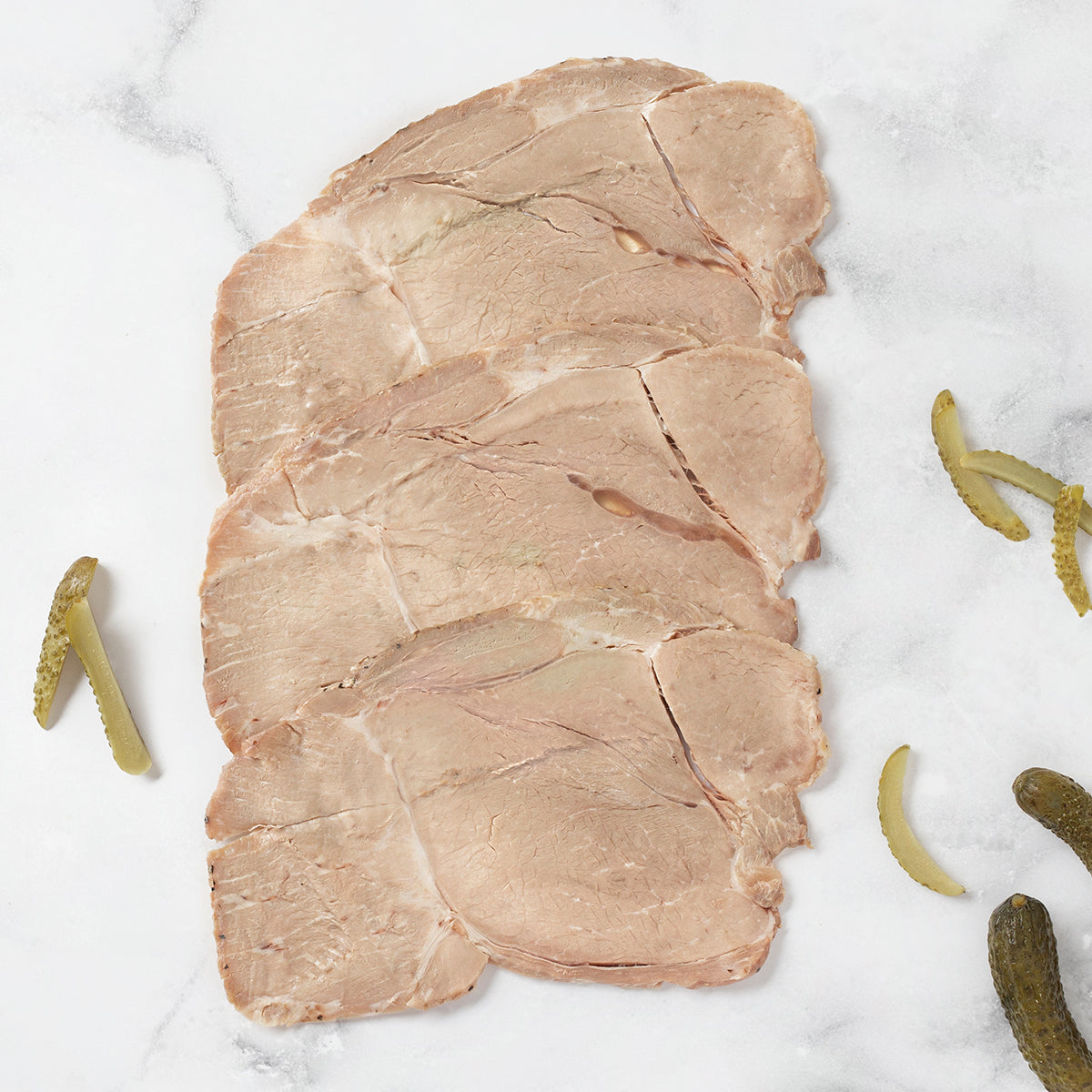 TRANCHES DE RÔTI DE PORC CONFIT À LA GRAISSE ET À L'AIL